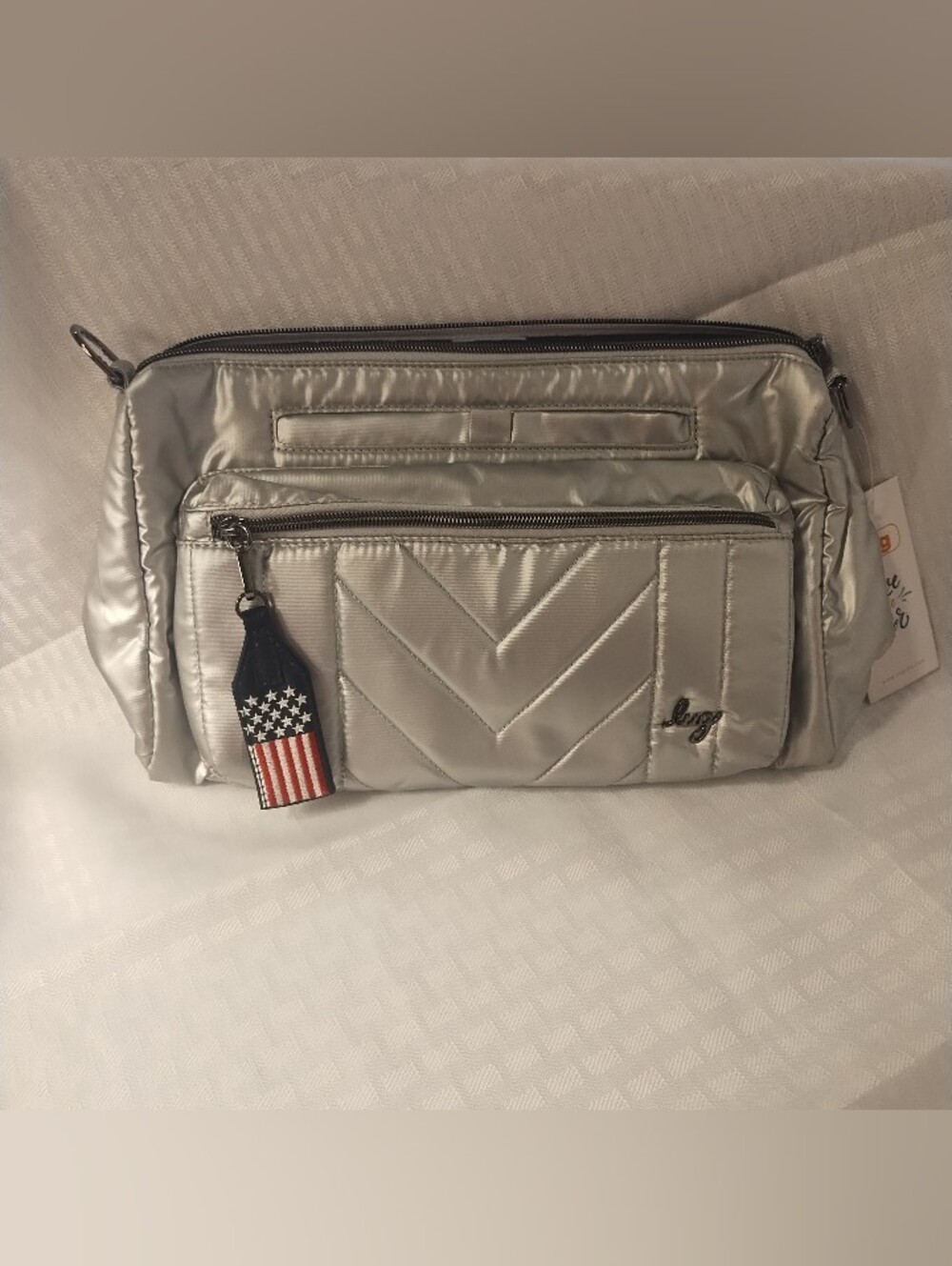 NWOT Lug Stretch LE Crossbody, Silver